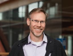 Dr Tim Dwyer
